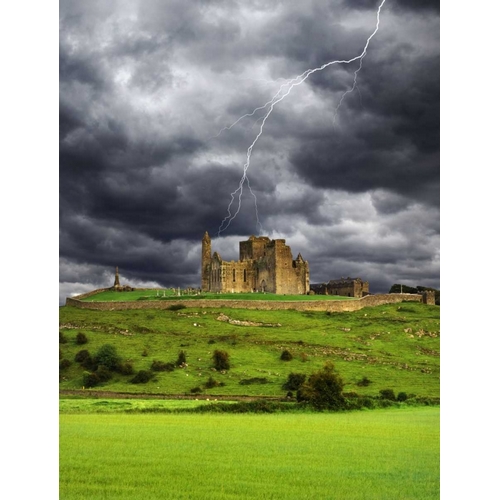 Ireland, Tipperary Lightning over Rock of Cashel